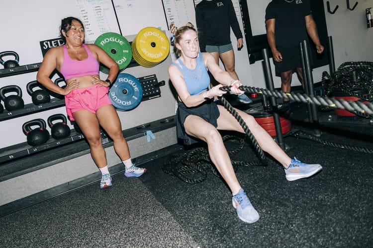 Women on sled pull at HYROX SIM in Seattle